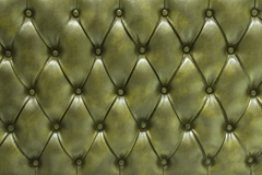 绿色皮质沙发软包背景图片